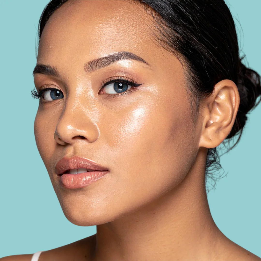 AuraMed beauty portrait on an aqua background