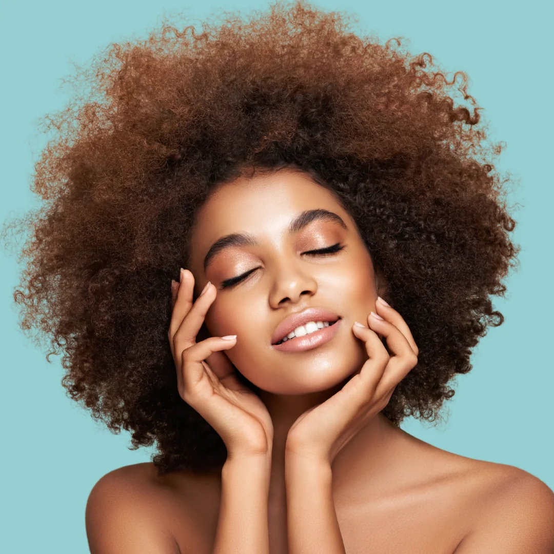 AuraMed beauty collection on an aqua background